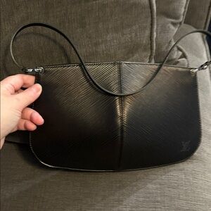 Louis Vuitton Textured Black Handbag. Demi lune noir epi leather handbag